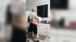 The maid got banged in the butt in the kitchen whilst washing the dishes.