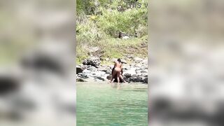 Floozy having sex on the beach with a stranger.