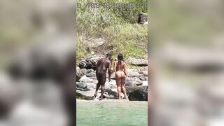 Floozy having sex on the beach with a stranger.