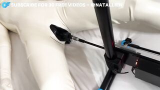Latex female-dominator takes screw machine then pegs her sub hard