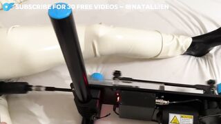 Latex female-dominator takes screw machine then pegs her sub hard