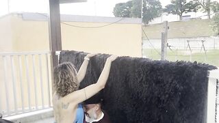 Strangers making out on a balcony during the party.
