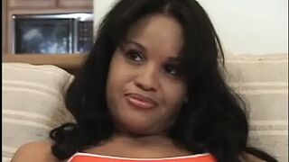 Ebony wench wraps her lips around hard ramrod in advance of getting fucked on the sofa