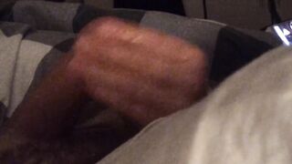 Close up POV tugjob from wife in couch during the time that that babe plays on her smartphone