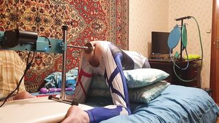 Femboy in an erotic suit Harley Quinn homemade amateur gets her gap banged by a giant sex tool on a Bang Machine