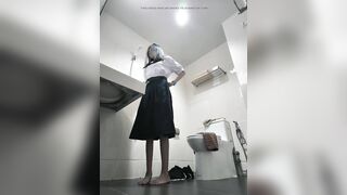 Change into a school uniform in the restroom