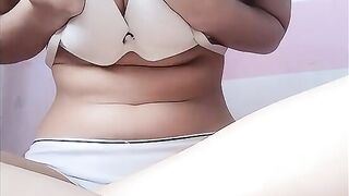 Close-up malay playgirl fingers her snatch