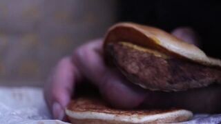 close up - screwing a cheeseburger