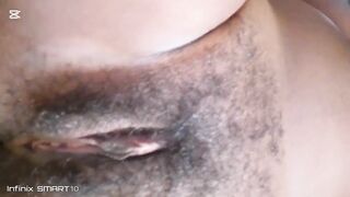 Black solo showing curly cunt