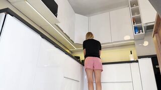 Hawt sexy golden-haired hotty in pajama shorts in the kitchen wishes to flash her cunt no pants below her pyjama
