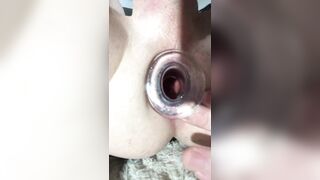 Sissy playing with clitty and tunnel plug