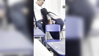 A youthful eighteen-year-old beauty giving head to her ally in the classroom.