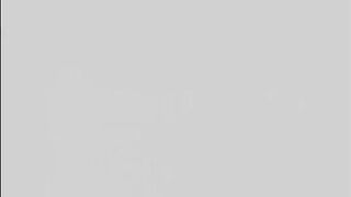 Redheaded slave with whip welts on ass gets EKG paddles on tits from BDSM hottie