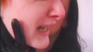 Redheaded slave with whip welts on ass gets EKG paddles on tits from BDSM hottie