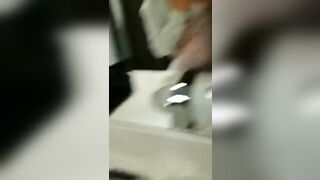 Girl helps milk her friend