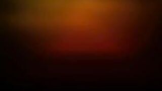 Lesbian fingering in a massage video