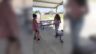 Mexican Girl gives her Friend a Spanking Bending over the Table