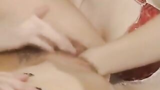 Hot redhead Fovea fists a brunette slut