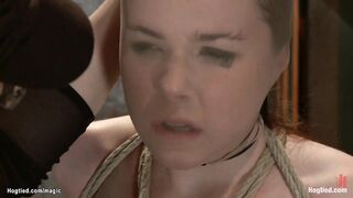 Lesbian in bondage on wooden pony