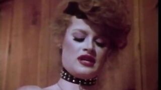 Busty Redhaired dyke Lisa De Leeuw drills her sexual slaves Bridgette Monet and Little Oral Annie with her strap-on and makes then lick her beaver