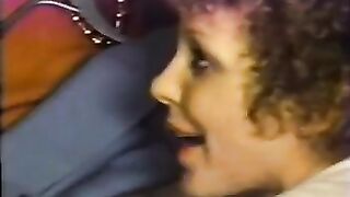 Mature is licking a young girl on a airline