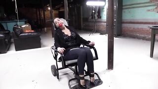 Gagged woman is about to get tied up and tortured in the basement, because she likes it