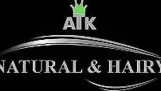 Hairy women Monica and Kimberly in hot lesbian scene on sofa