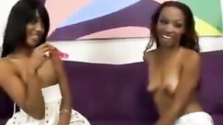 Ebony teens strip and use dildo