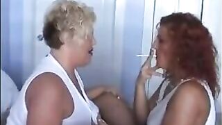 .Hot mature busty babes smoking and playing