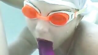 Lesbians with double-dildo underwater