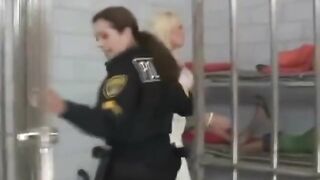 Blonde spanked by policewoman
