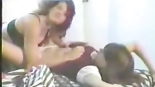 Mom And Daughter Play On Bed
