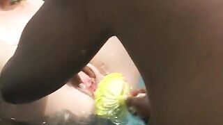 Black and white lesbians having sex in a pool