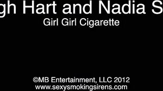 2 Alternate girls with tats do some smoking, and licking, and dildoing