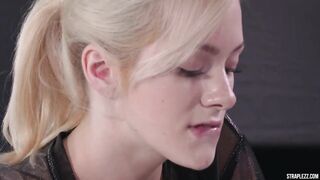 Blonde lesbian is fucking her red haired girlfriend from the back, with a strap- on