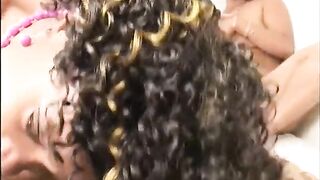 Playful black ample girl invited a couple of curious ebony hotties