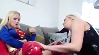 Blonde latex Milfs licking and fucking each other pussy