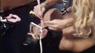 Mistress licks slave's cunt and puts anal beads