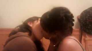 Girls Making Out On A Bed