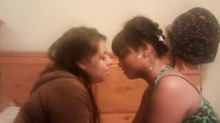 Girls Making Out On A Bed