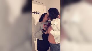 2 girls frenchkissing in the bathroom