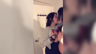 2 girls frenchkissing in the bathroom