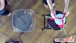 4 girls play a game of strip pop the balloon