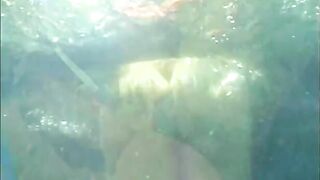 2 big tit lesbians in action in the pool