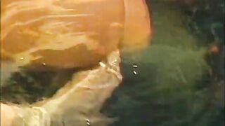 2 big tit lesbians in action in the pool