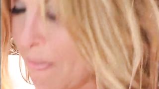 Two lusty blondes lick pussies and play with dildo near the pool