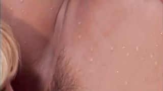 Two lusty blondes lick pussies and play with dildo near the pool