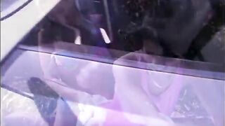 Two playful girls wash the car and give skull job