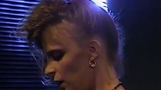 Lesbian licking and strapon fucking on a couch