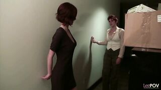 Horny lesbians are using a strap- on to fuck each other's brains out, while at work